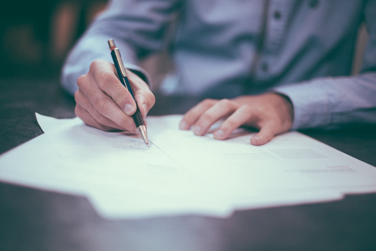 Tax forms being prepared, representing tax and compliance services